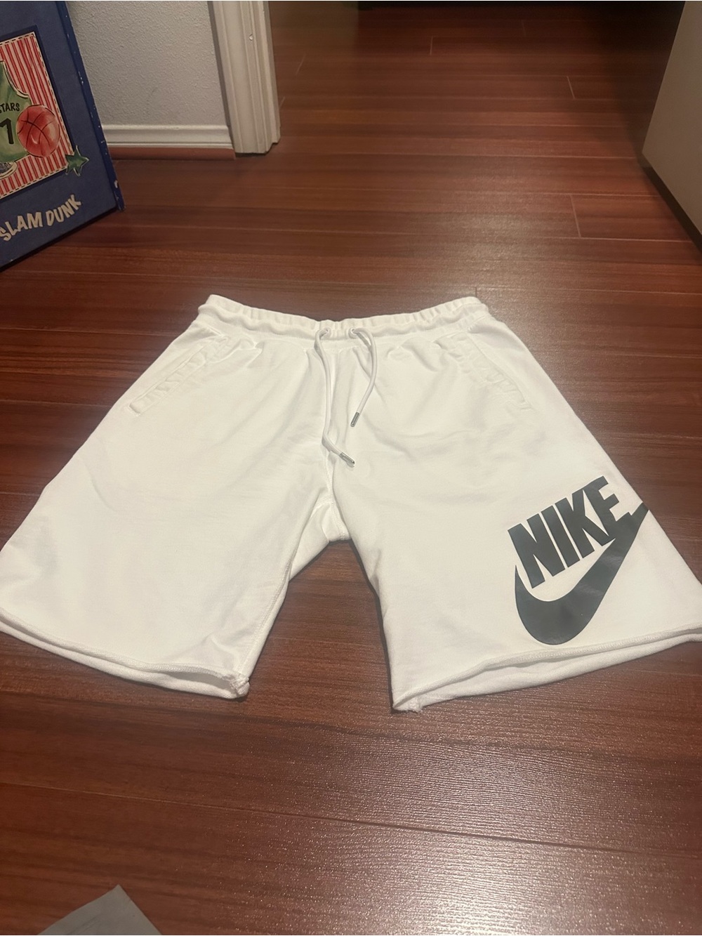 Nike White Athletic Logo Shorts with Black Swoosh